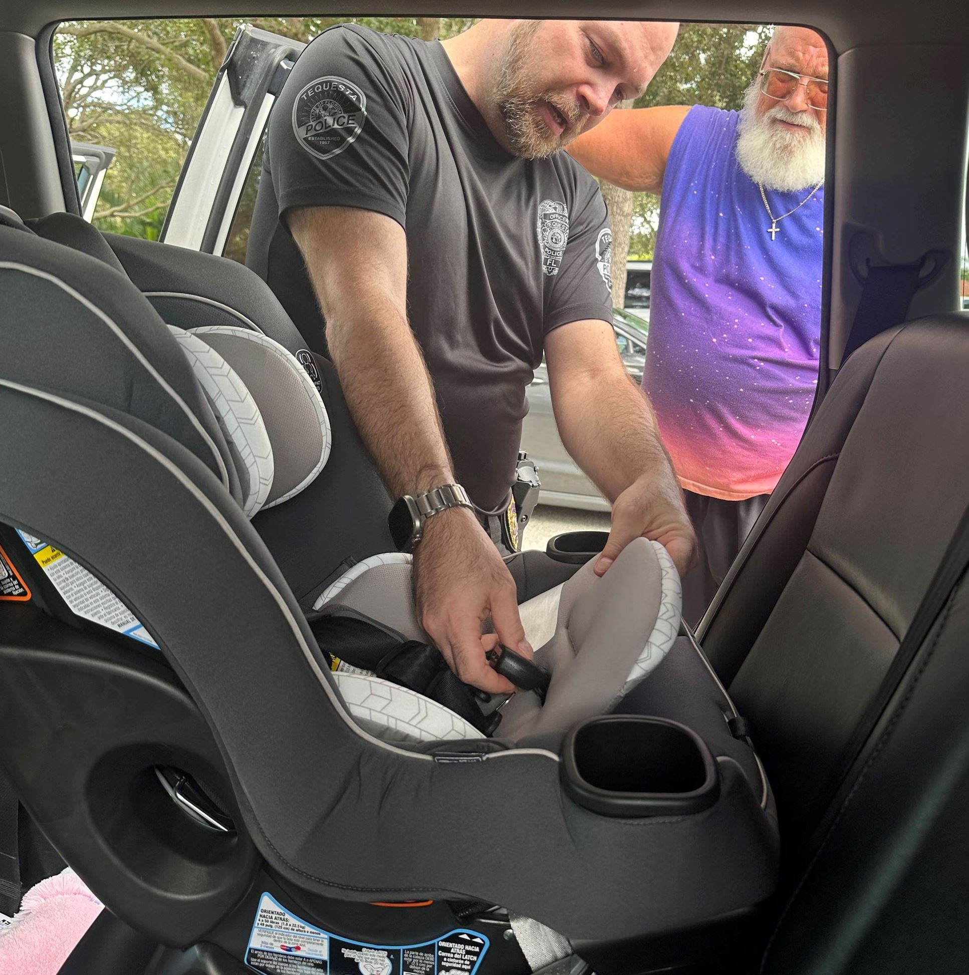 Officer Installing a Car Seat